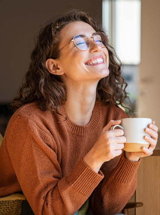 happy woman drinking coffee